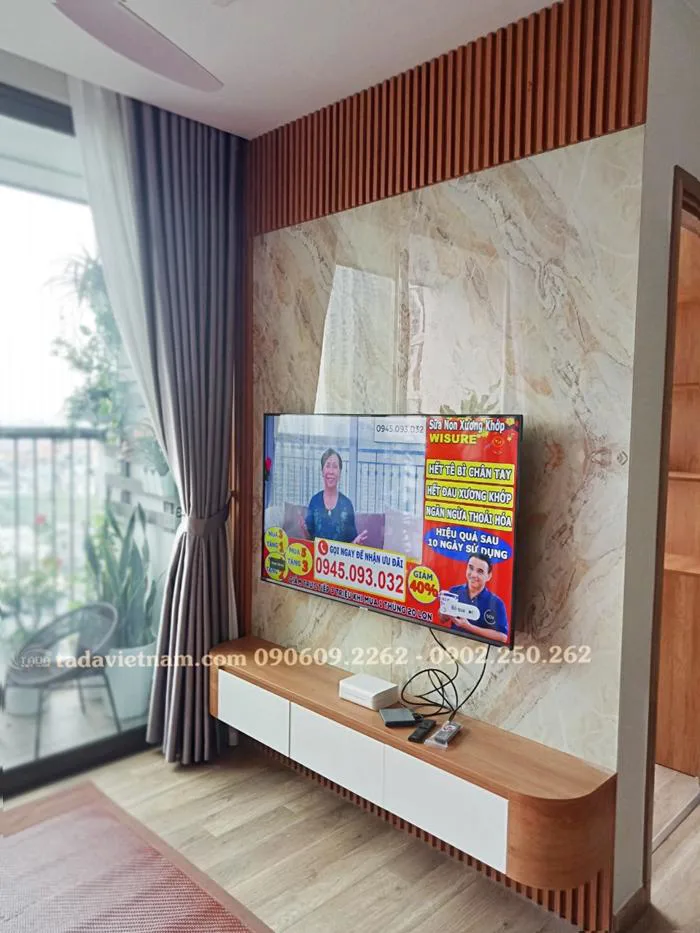 Kệ tivi treo tường hiện đại kiểu dáng bo cong sang trọng cho phòng khách  TDTV77
