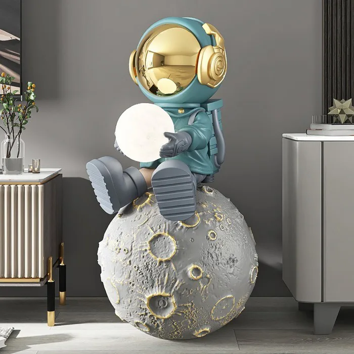 Mẫu tượng phi hành gia nhí ngồi trên mặt trăng để sàn đẹp mắt Shop đồng hồ cát Hà Nội Mẫu tượng phi hành gia nhí ngồi trên mặt trăng để sàn đẹp mắt Shop đồng hồ cát Hà Nội